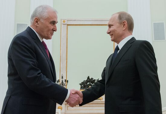 Russian President Vladimir Putin meets with South Ossetian President Leonid Tibilov