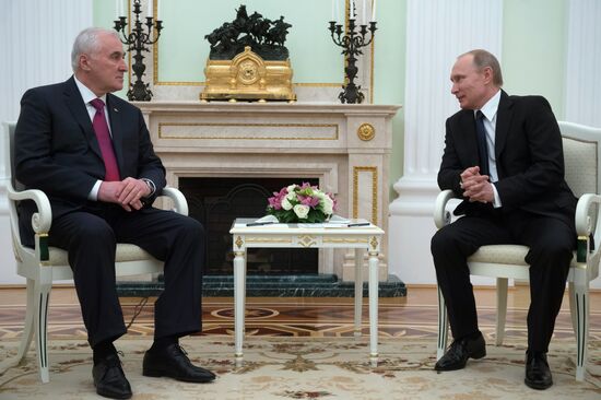 Russian President Vladimir Putin meets with South Ossetian President Leonid Tibilov