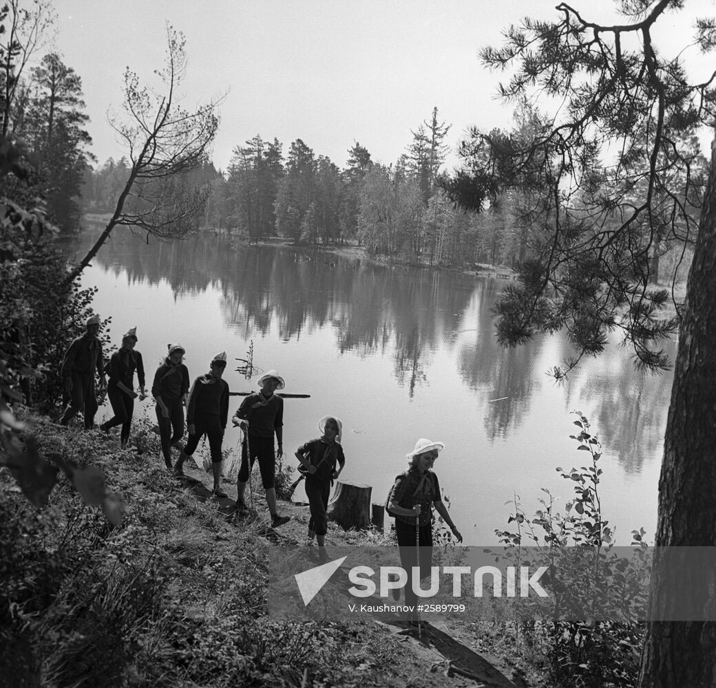 Holiday-makers on the river-side