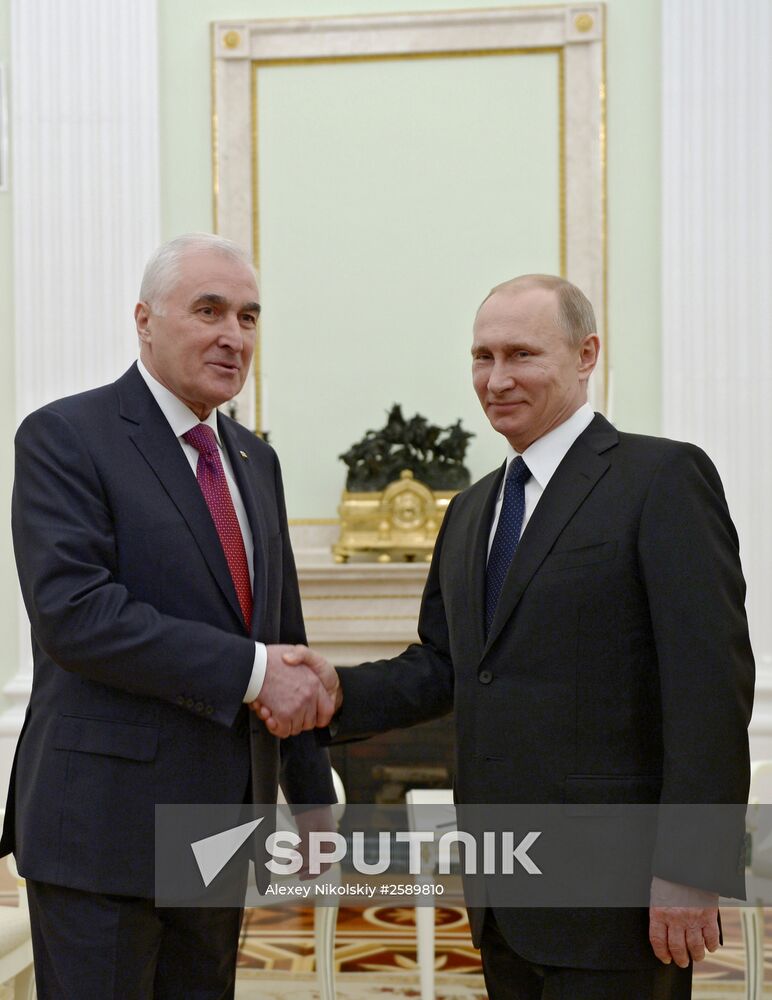 Russian President Vladimir Putin meets with South Ossetian President Leonid Tibilov