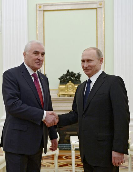 Russian President Vladimir Putin meets with South Ossetian President Leonid Tibilov