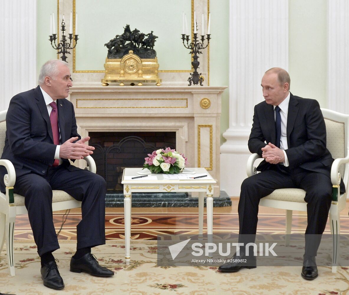 Russian President Vladimir Putin meets with South Ossetian President Leonid Tibilov