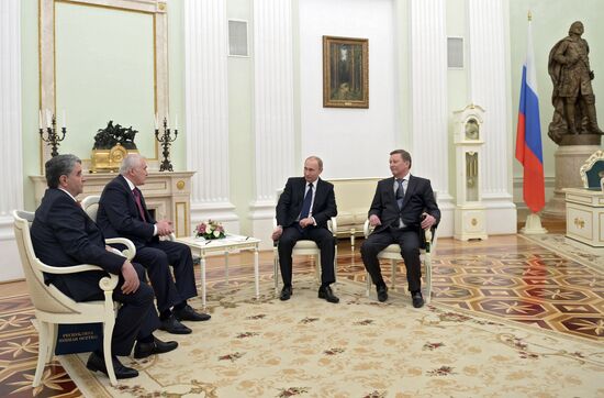 Russian President Vladimir Putin meets with South Ossetian President Leonid Tibilov