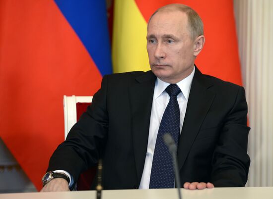 Russian President Vladimir Putin meets with South Ossetian President Leonid Tibilov
