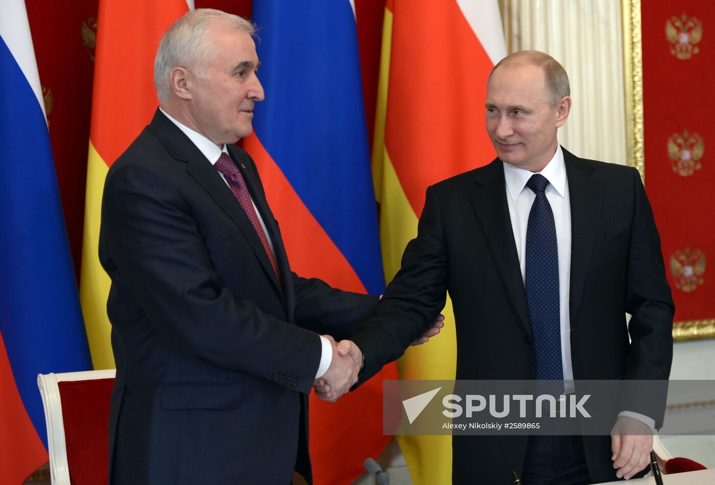 Russian President Vladimir Putin meets with South Ossetian President Leonid Tibilov