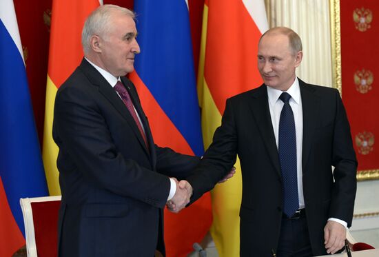 Russian President Vladimir Putin meets with South Ossetian President Leonid Tibilov