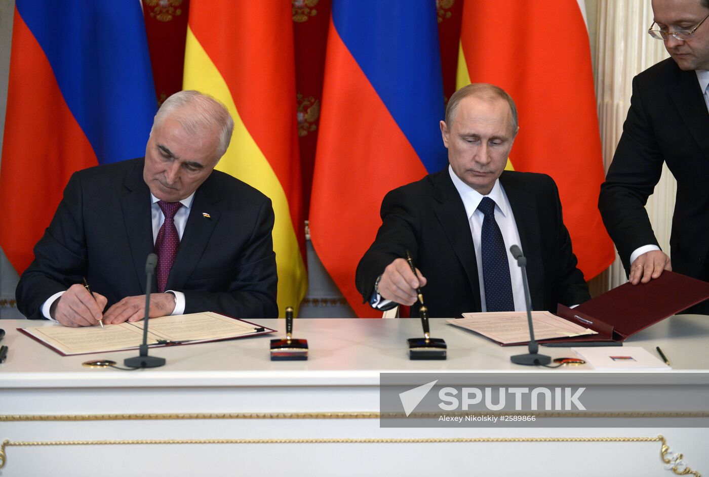 Russian President Vladimir Putin meets with South Ossetian President Leonid Tibilov