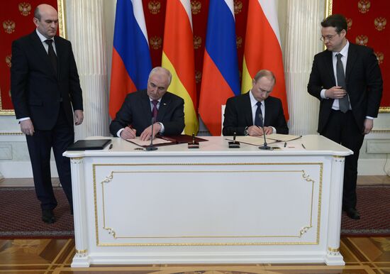 Russian President Vladimir Putin meets with South Ossetian President Leonid Tibilov
