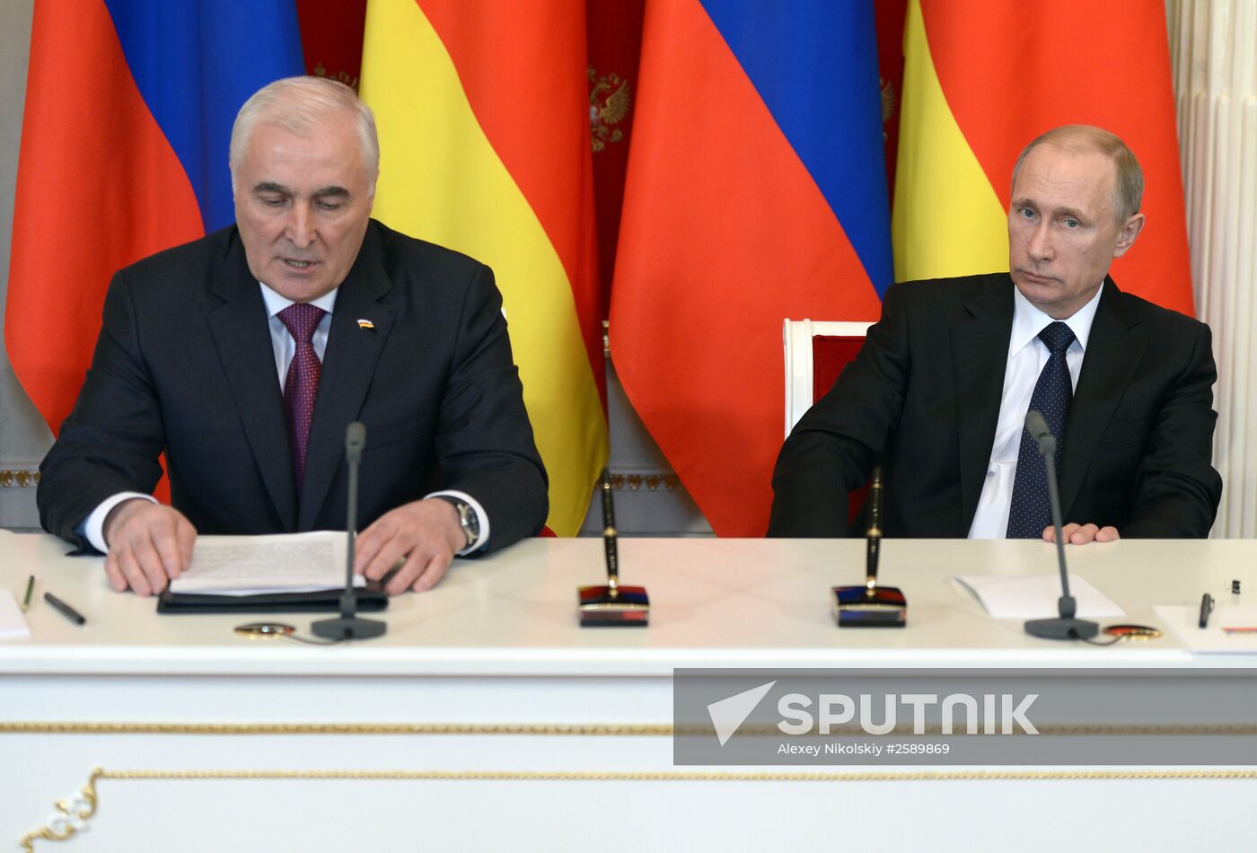 Russian President Vladimir Putin meets with South Ossetian President Leonid Tibilov