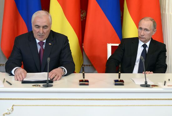 Russian President Vladimir Putin meets with South Ossetian President Leonid Tibilov