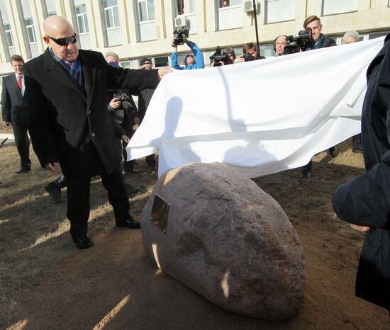 Unveiling a memorial stone to honor he 50th anniversary of the first human travel to outer space