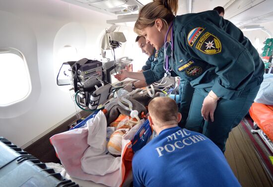 EMERCOM An-148 aircraft evacuates severly injured child