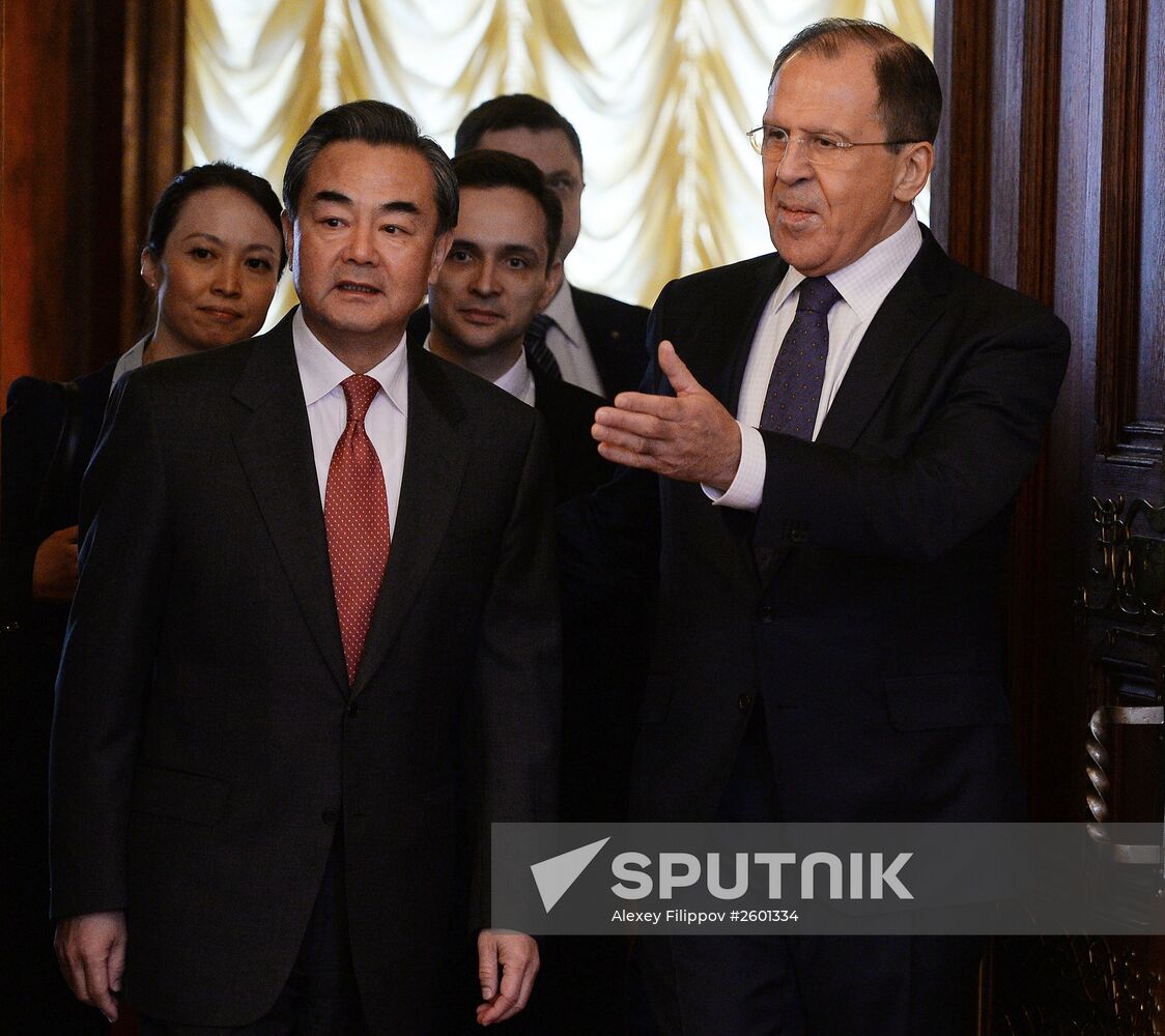 Russian Foreign Minister Sergei Lavrov meets with Chinese Foreign Minister Wang Yi
