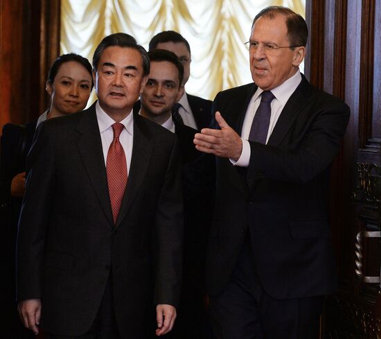 Russian Foreign Minister Sergei Lavrov meets with Chinese Foreign Minister Wang Yi