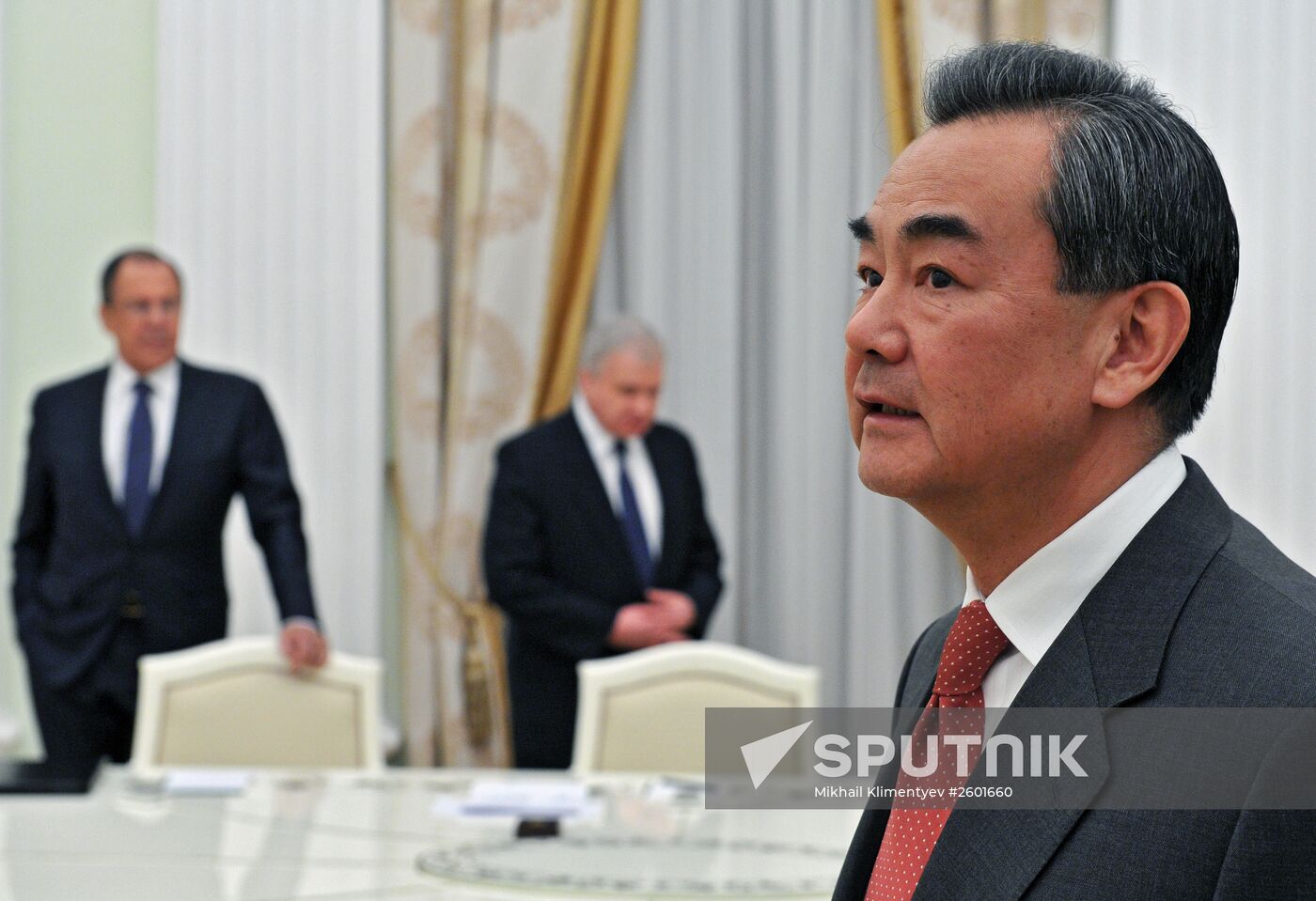 President Vldimir Putin meets with Chinese Foreign Minister Wang Yi