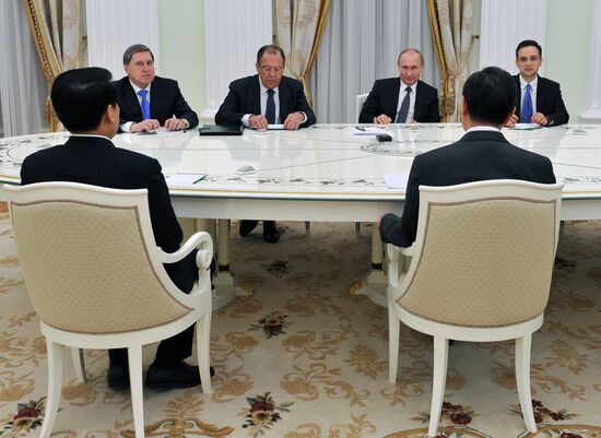 President Vladimir Putin meets with Chinese Foreign Minister Wang Yi