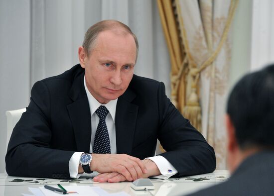 President Vladimir Putin meets with Chinese Foreign Minister Wang Yi