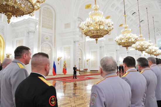 Russian President Vladimir Putin meets with senior officers and prosecutors in the Kremlin