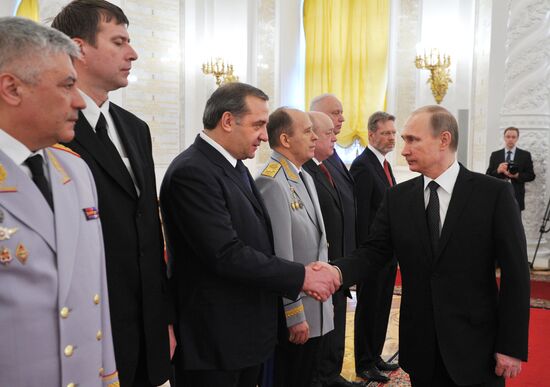 Russian President Vladimir Putin meets with senior officers and prosecutors in the Kremlin