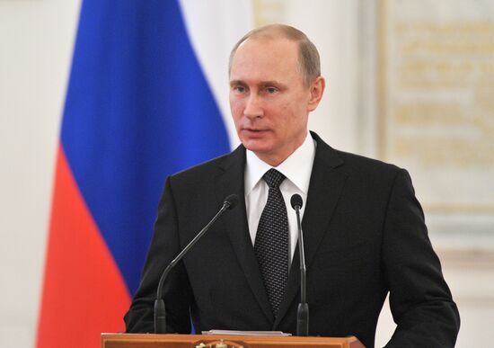 Russian President Vladimir Putin meets with senior officers and prosecutors in the Kremlin