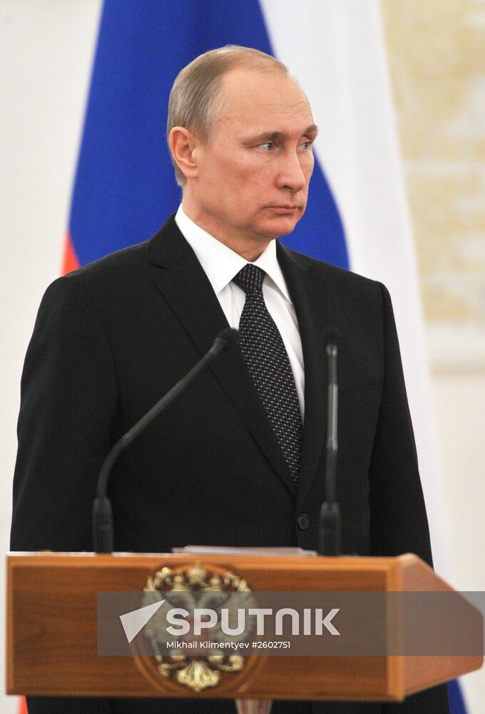 Russian President Vladimir Putin meets with senior officers and prosecutors in the Kremlin