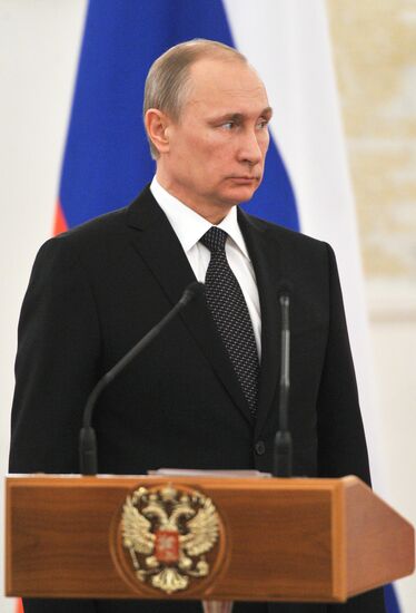 Russian President Vladimir Putin meets with senior officers and prosecutors in the Kremlin