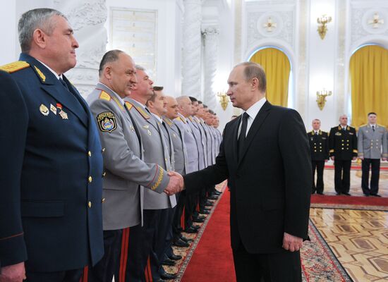 Russian President Vladimir Putin meets with senior officers and prosecutors in the Kremlin
