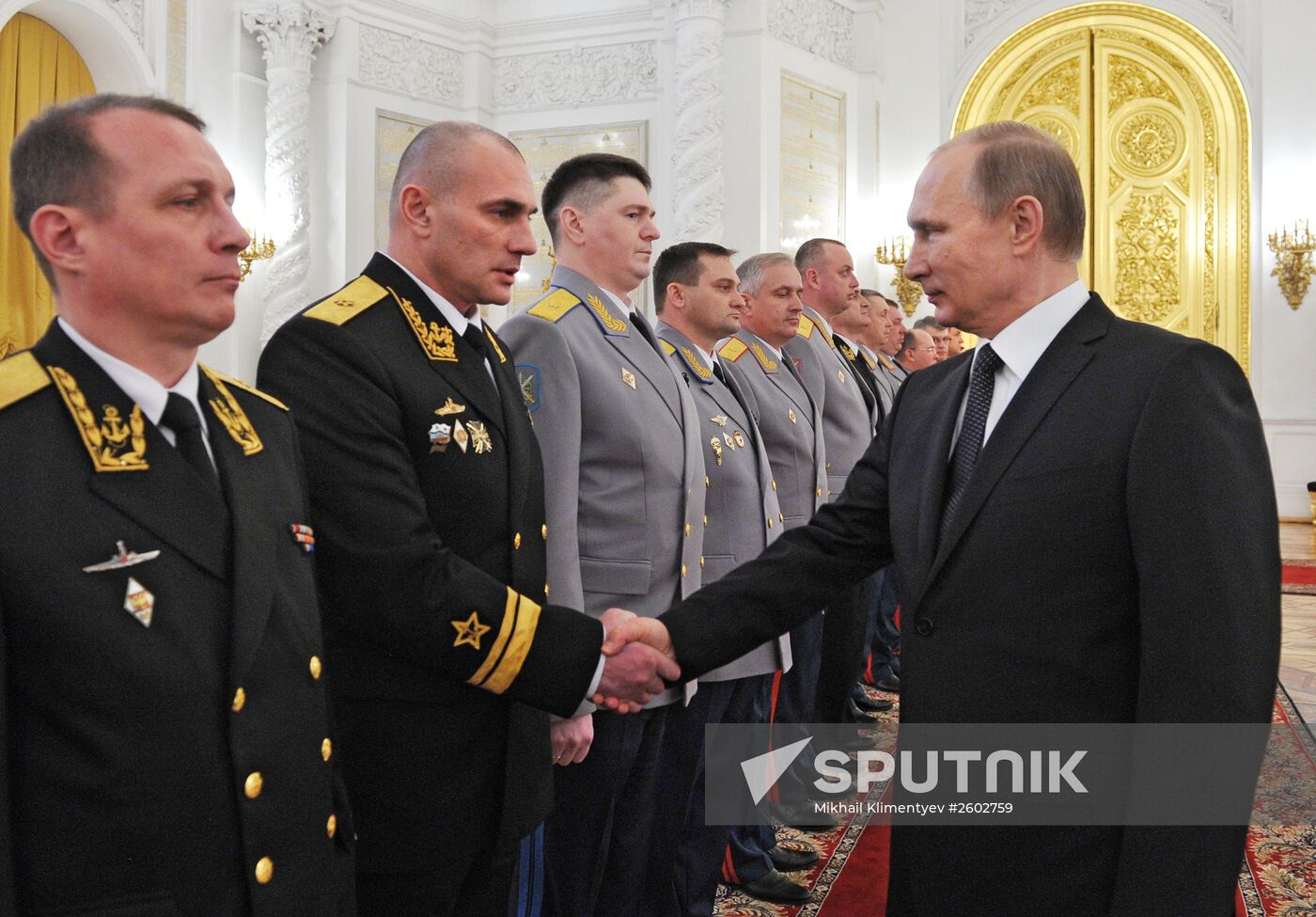 Russian President Vladimir Putin meets with senior officers and prosecutors in the Kremlin