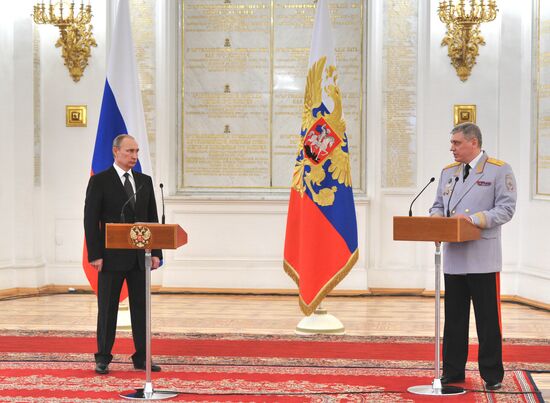 Russian President Vladimir Putin meets with senior officers and prosecutors in the Kremlin