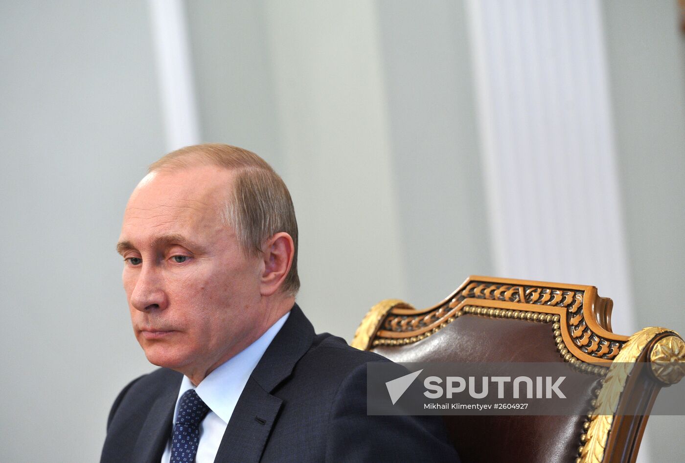 President Vladimir Putin meets with Deputy Prime Minister Dmitry Rogozin and Roscosmos Head Igor Komarov