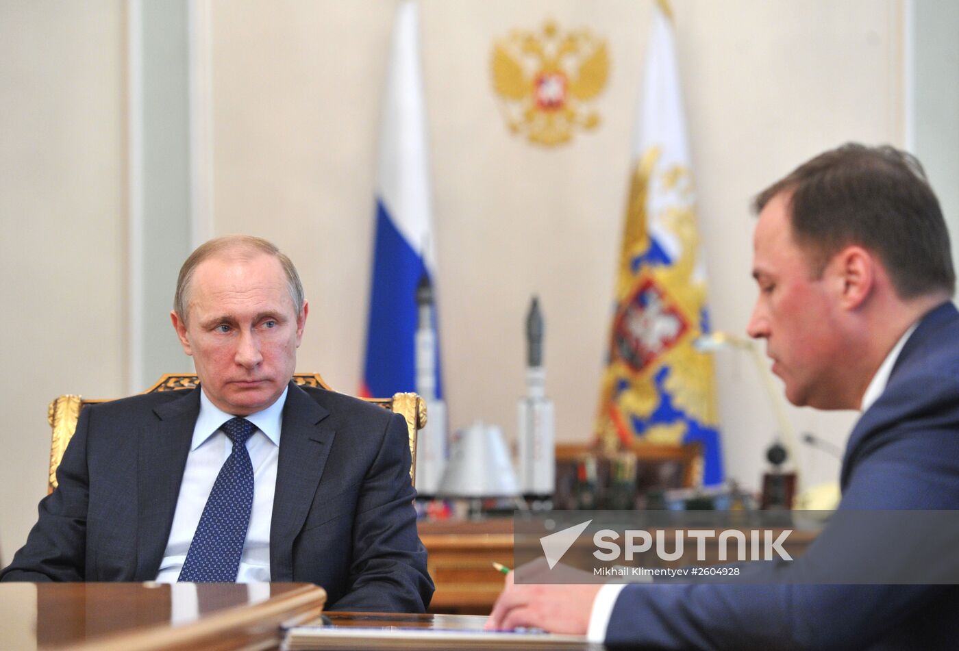 President Vladimir Putin meets with Deputy Prime Minister Dmitry Rogozin and Roscosmos Head Igor Komarov