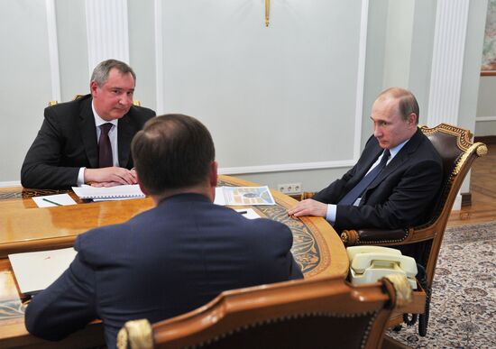 President Vladimir Putin meets with Deputy Prime Minister Dmitry Rogozin and Roscosmos Head Igor Komarov
