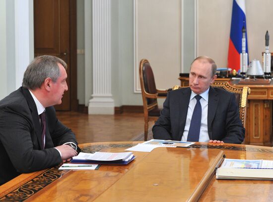 President Vladimir Putin meets with Deputy Prime Minister Dmitry Rogozin and Roscosmos Head Igor Komarov