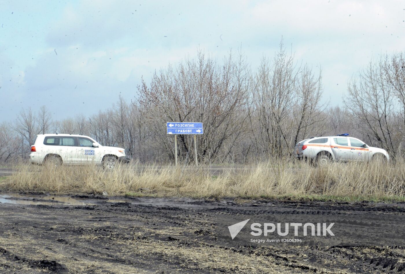 Dutch and Malaysian experts visit site of Malaysia Airlines flight MH17 plane crash