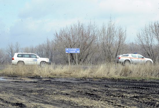 Dutch and Malaysian experts visit site of Malaysia Airlines flight MH17 plane crash