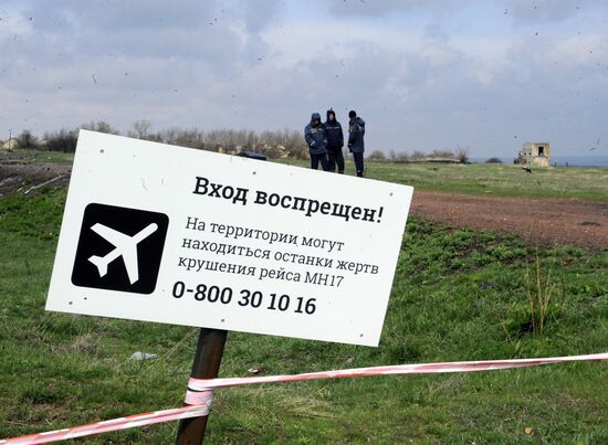 Dutch and Malaysian experts visit site of Malaysia Airlines flight MH17 plane crash