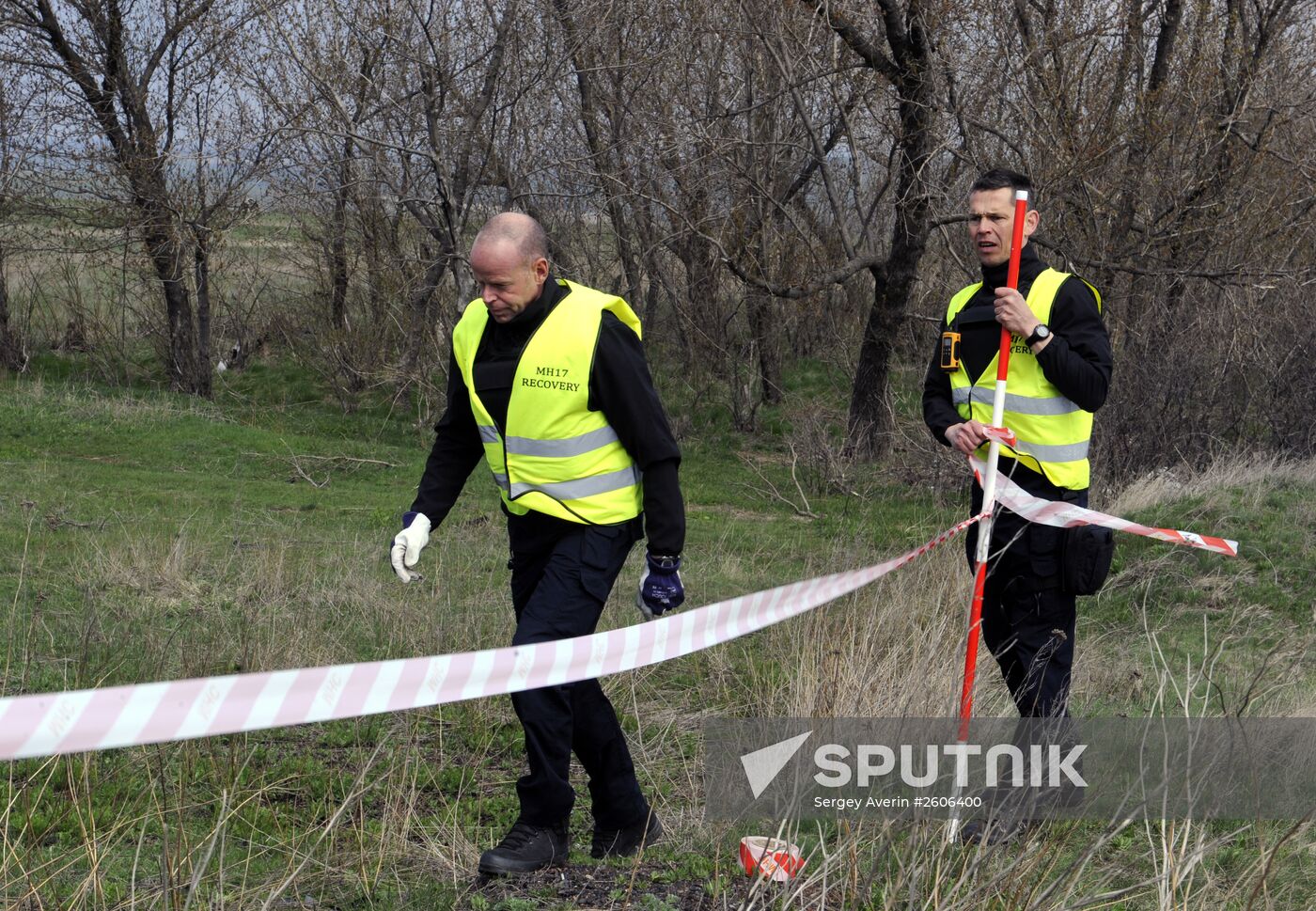 Dutch and Malaysian experts visit site of Malaysia Airlines flight MH17 plane crash