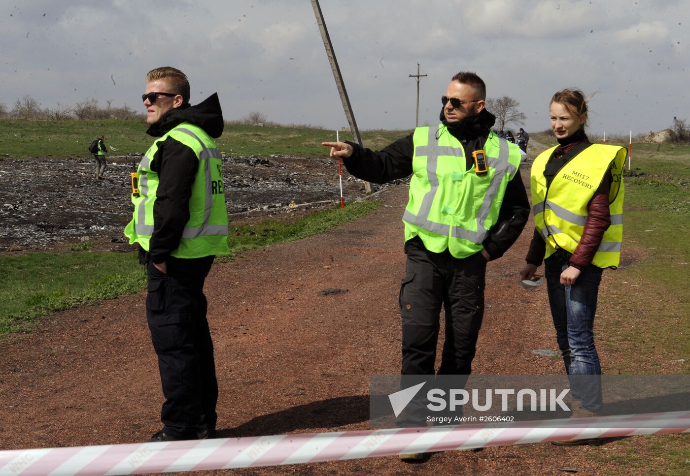 Dutch and Malaysian experts visit site of Malaysia Airlines flight MH17 plane crash
