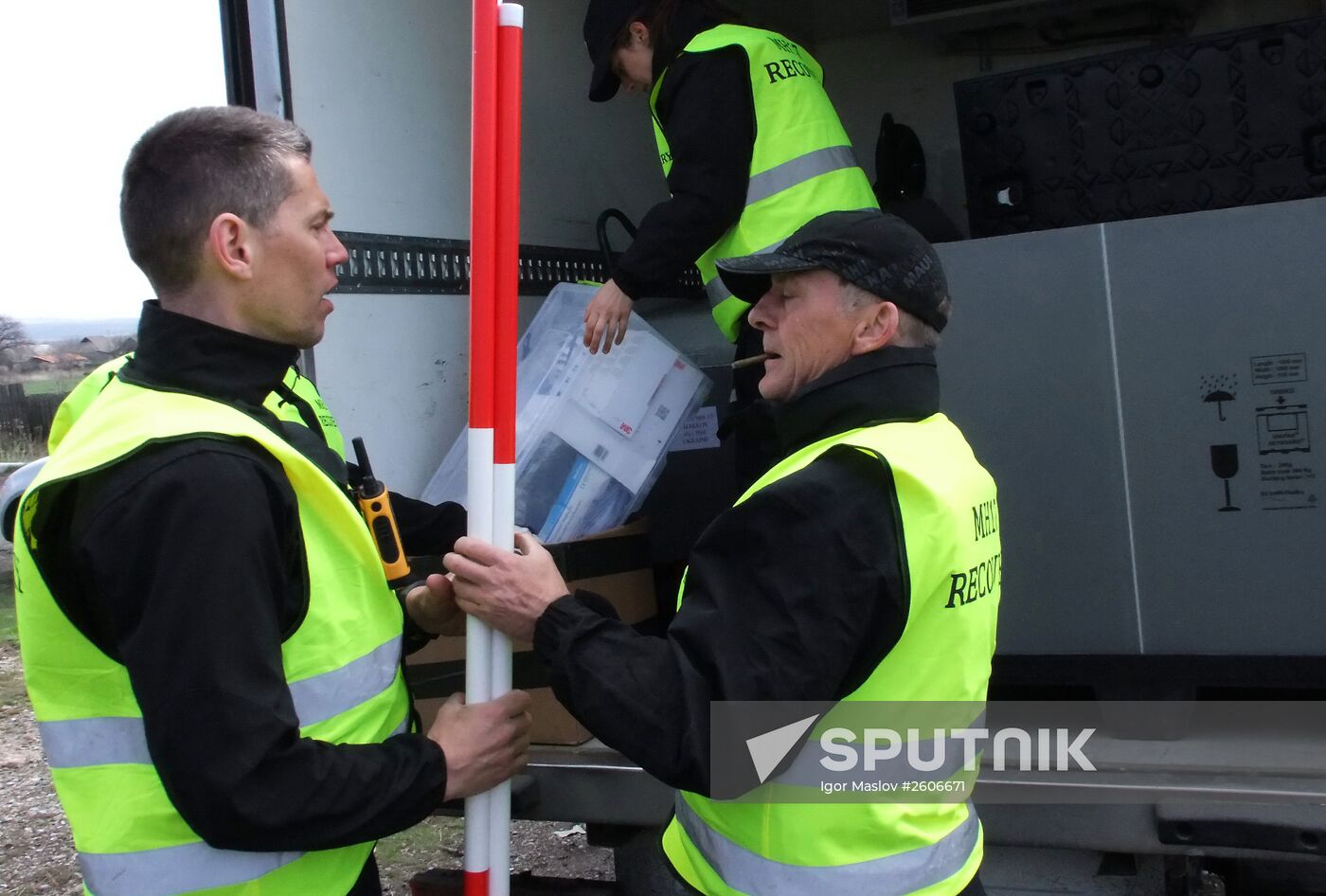 Dutch and Malaysian experts visit site of Malaysia Airlines flight MH17 plane crash