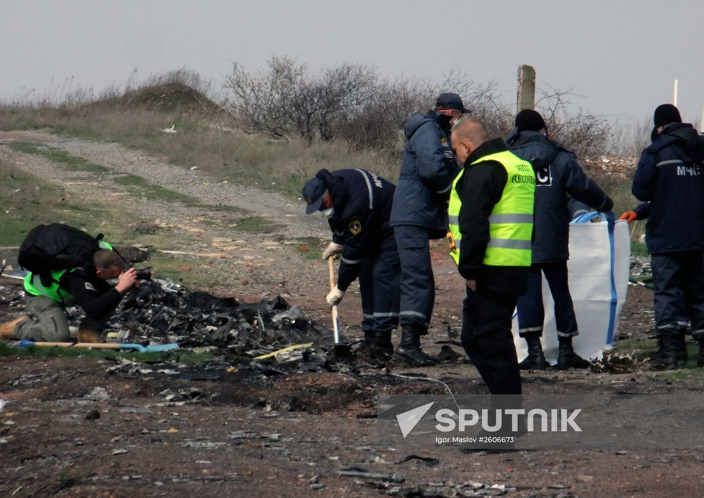 Dutch and Malaysian experts visit site of Malaysia Airlines flight MH17 plane crash