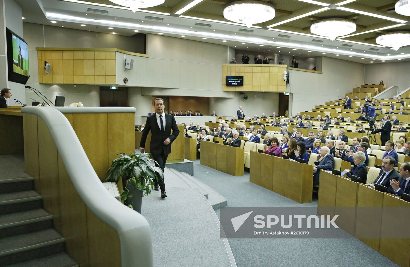 Prime Minister Dmitry Medvedev (center) at the State Duma, on delivering a government performance report for 2014, April 21, 2015. Location: Russia, Moscow. Author: Dmitry Astakhov/Sputnik. Dmitry Medvedev reports on the Government's performance at the State Duma of the Russian Federation
