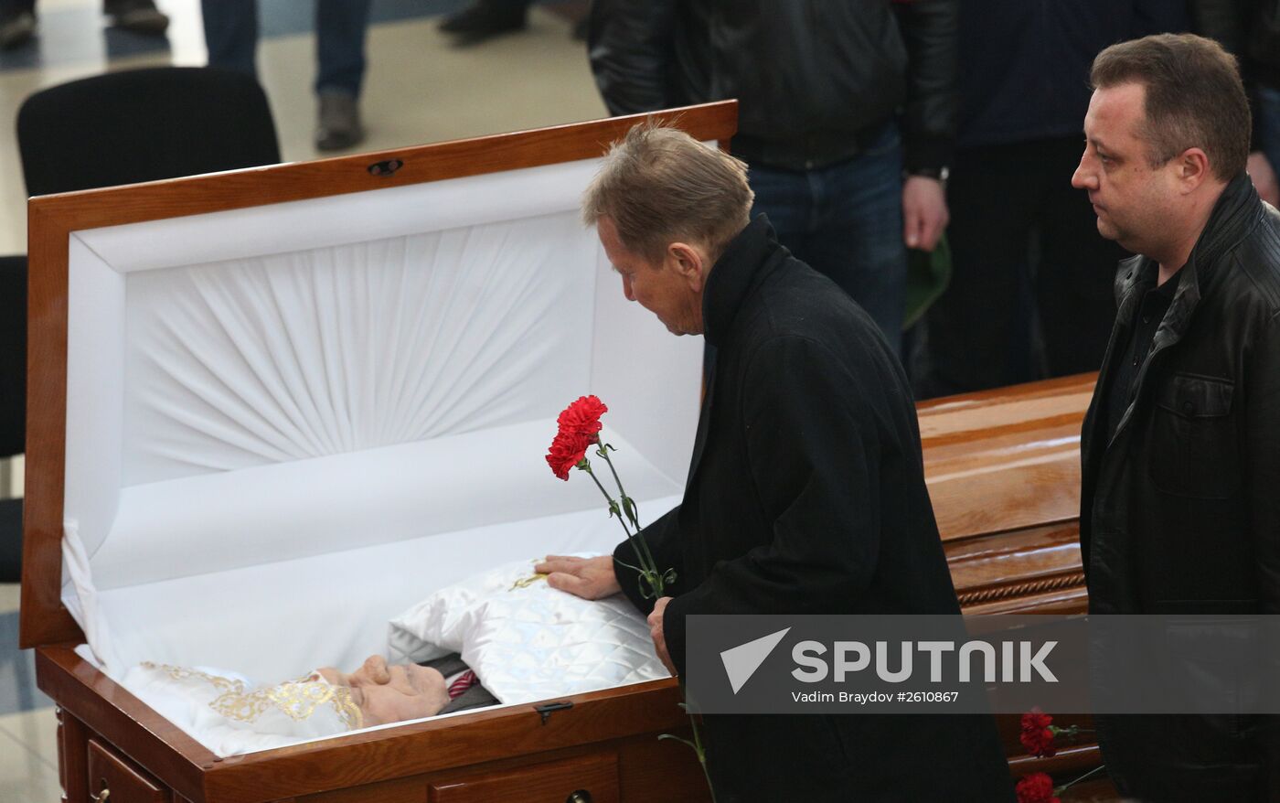 People pay last respects to hockey coach Sergei Mikhalev