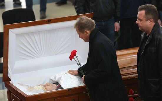 People pay last respects to hockey coach Sergei Mikhalev
