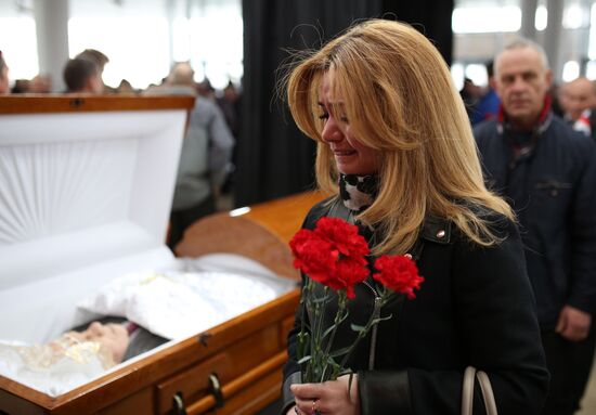 People pay last respects to hockey coach Sergei Mikhalev