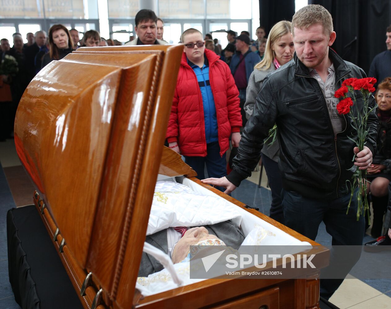 People pay last respects to hockey coach Sergei Mikhalev