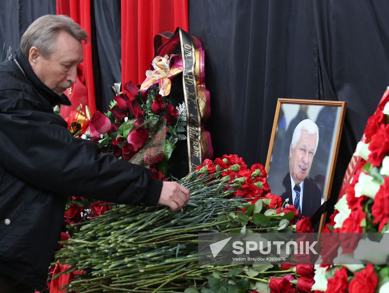 People pay last respects to hockey coach Sergei Mikhalev