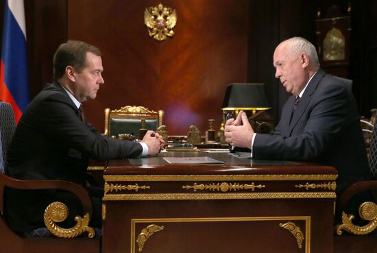 Russian Prime Minister Dmitry Medvedev meets with Rostec State Corporation Sergei Chemezov