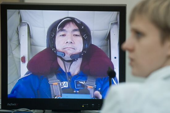 TsF-7 Centrifuge training by cosmonaut Oleg Kononenko and astronaut Yui Kimiya