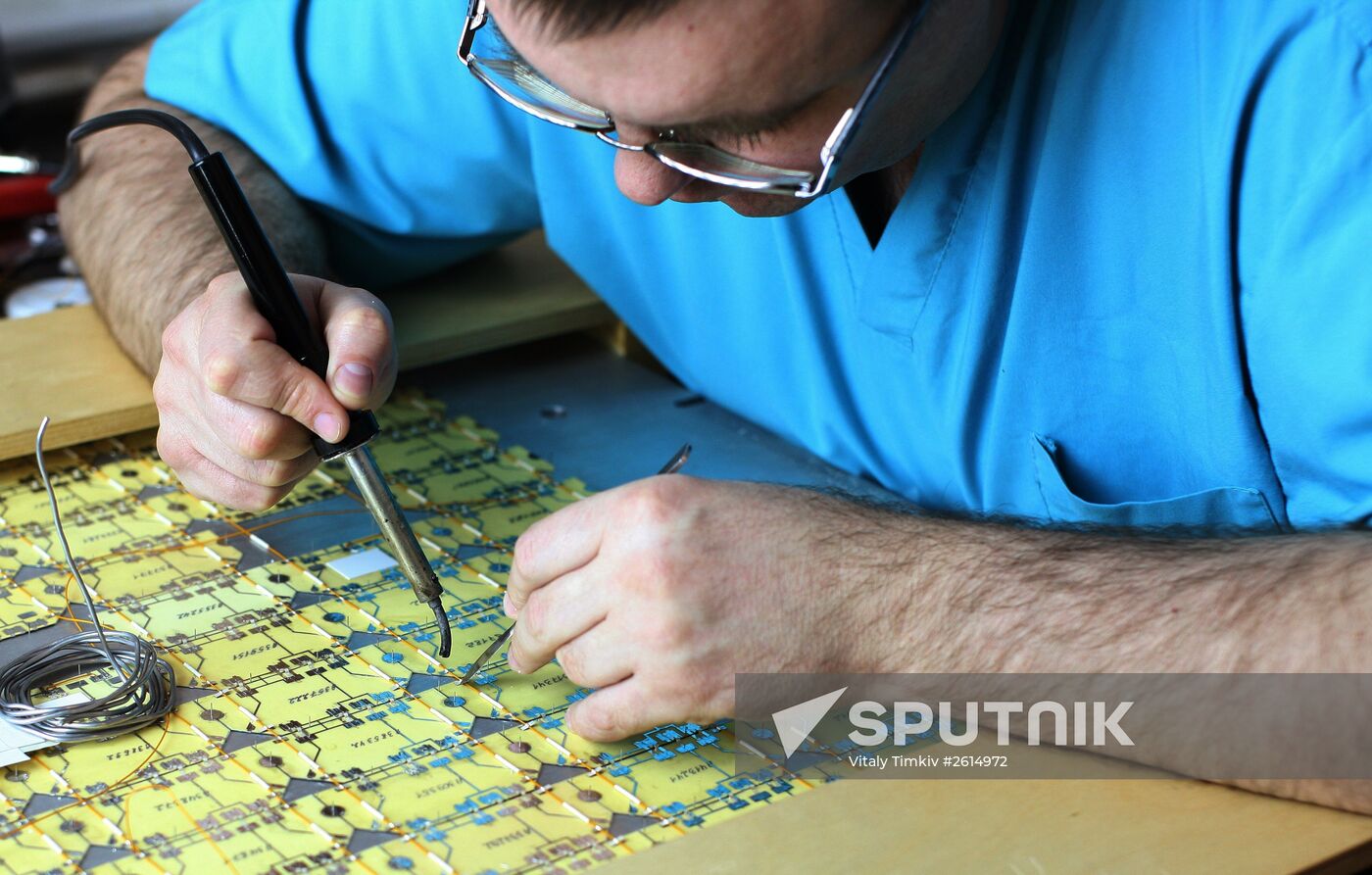 Manufacturing solar panels for spacecraft