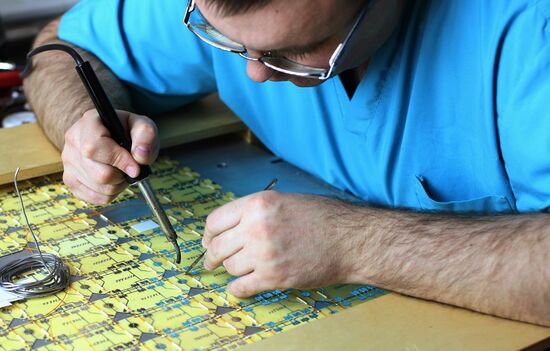Manufacturing solar panels for spacecraft